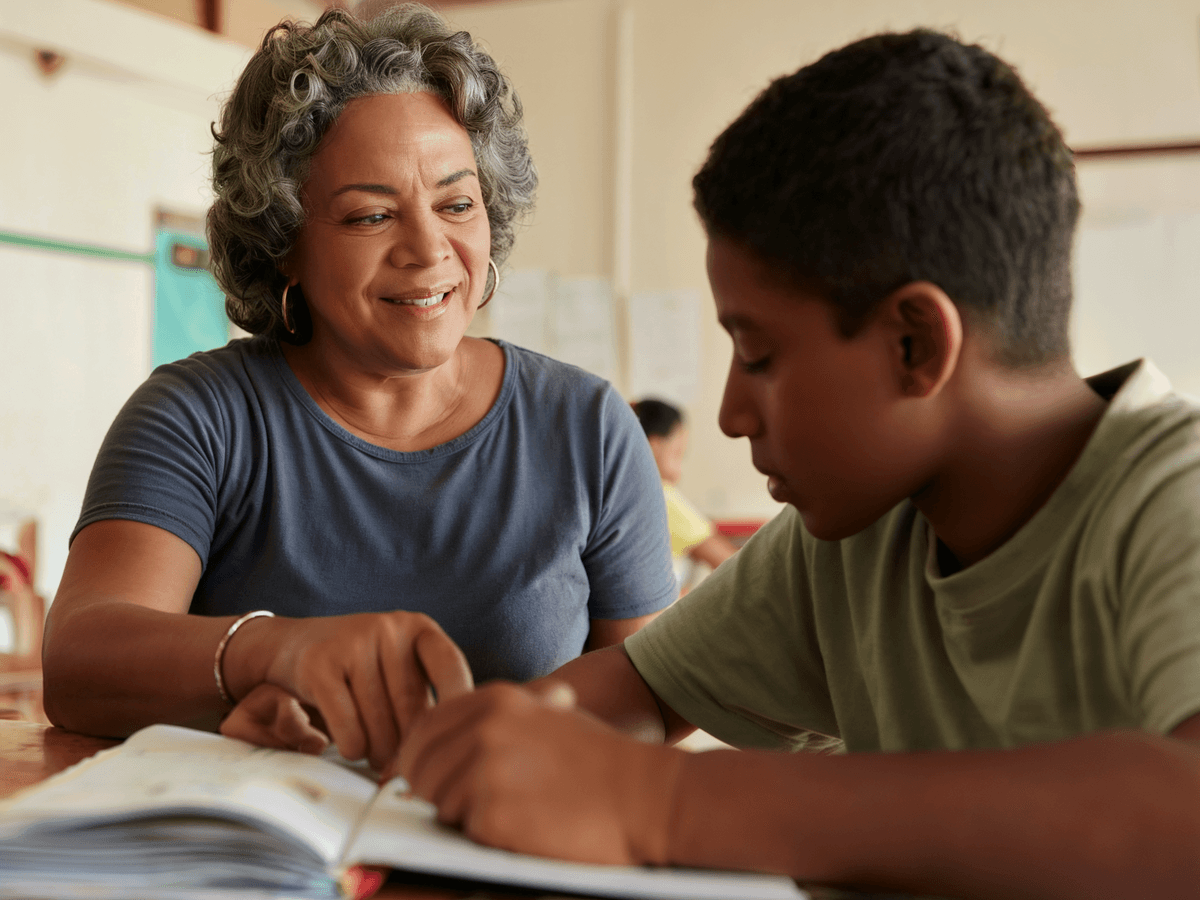 Volunteers working alongside Brazilian youth on a creative project